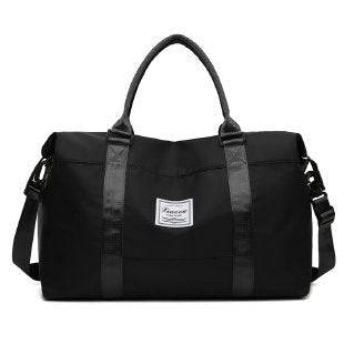 Black women's travel duffel bag by Box of Pandora with adjustable straps and multiple compartments