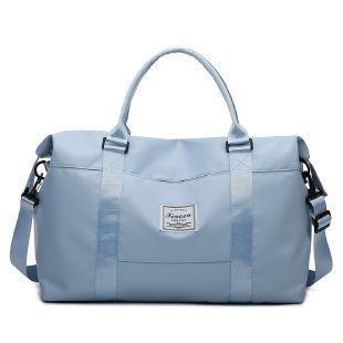 Light blue women's travel duffel bag with adjustable straps and spacious interior for convenience
