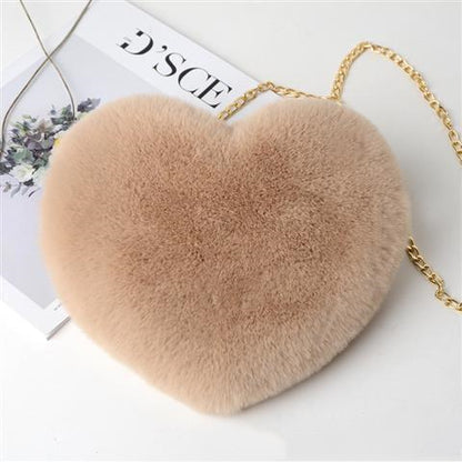 Beige plush heart shoulder bag for women with a soft texture and gold chain strap