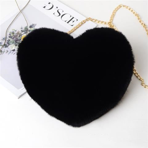 Stylish black plush heart shoulder bag for women with a gold chain strap for a trendy look