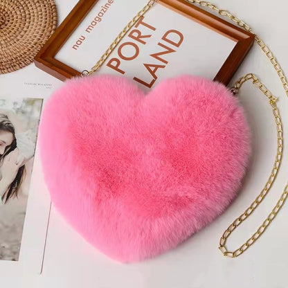 Pink plush heart shoulder bag for women with a stylish chain strap for casual outings
