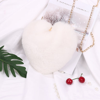 Plush heart shoulder bag for women in white, perfect for stylish outings and everyday use
