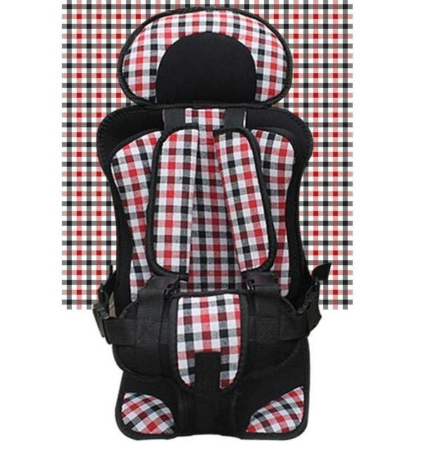 Box of Pandora portable baby car seat with red black and white checkered pattern and safety harness