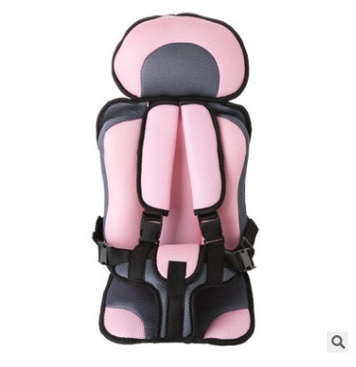 Box of Pandora portable baby car seat in pink and black with padded straps and head support