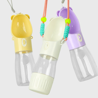 Portable dog water bottle for small and big dogs in yellow white and purple colors with attached lanyards