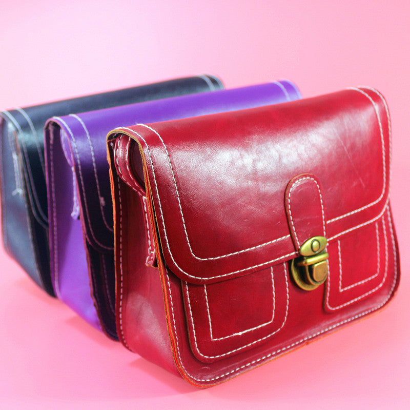 Vintage-inspired retro buckle shoulder bag in red, purple, and black colors for stylish accessories