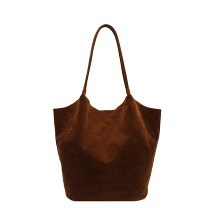 Brown suede retro women's shoulder bag with a spacious interior and long straps