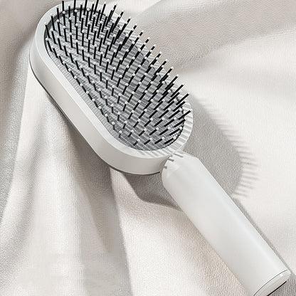 Yiwu Renfan self cleaning hair brush with airbag massage and black bristles on white handle