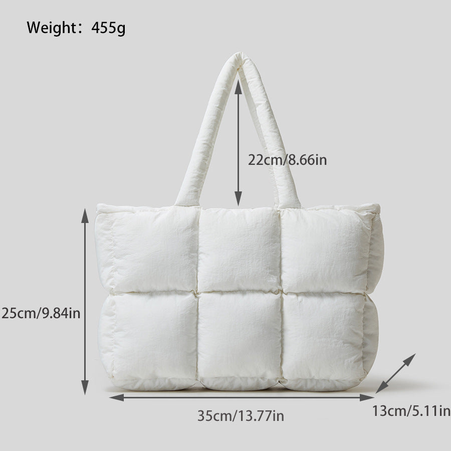 Soft cotton down handbag in white with quilted design and sturdy handles for everyday use