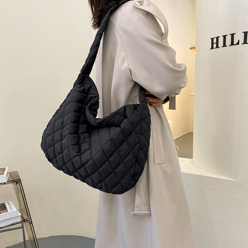 Black quilted soft warm shoulder bag for women, perfect for everyday use and stylish outfits