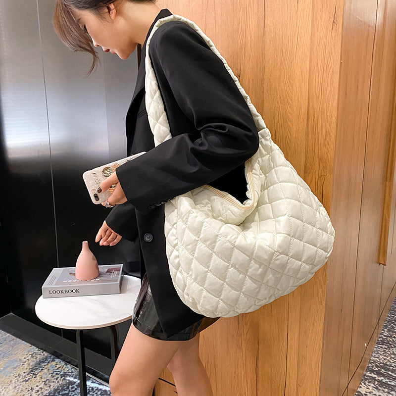 Stylish soft warm shoulder bag for women in cream quilted design, perfect for everyday use