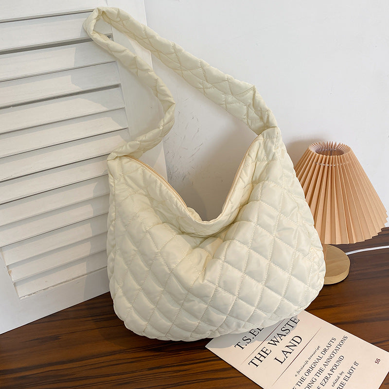 Soft warm shoulder bag for women in cream quilted design perfect for everyday use