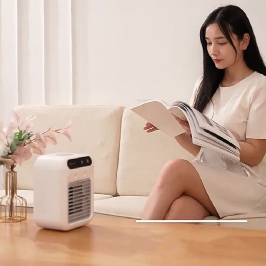 Hangzhou Jingqian portable air conditioner near woman reading on couch energy efficient air conditioner alternative